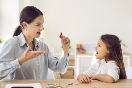 Speech language pathologist and student